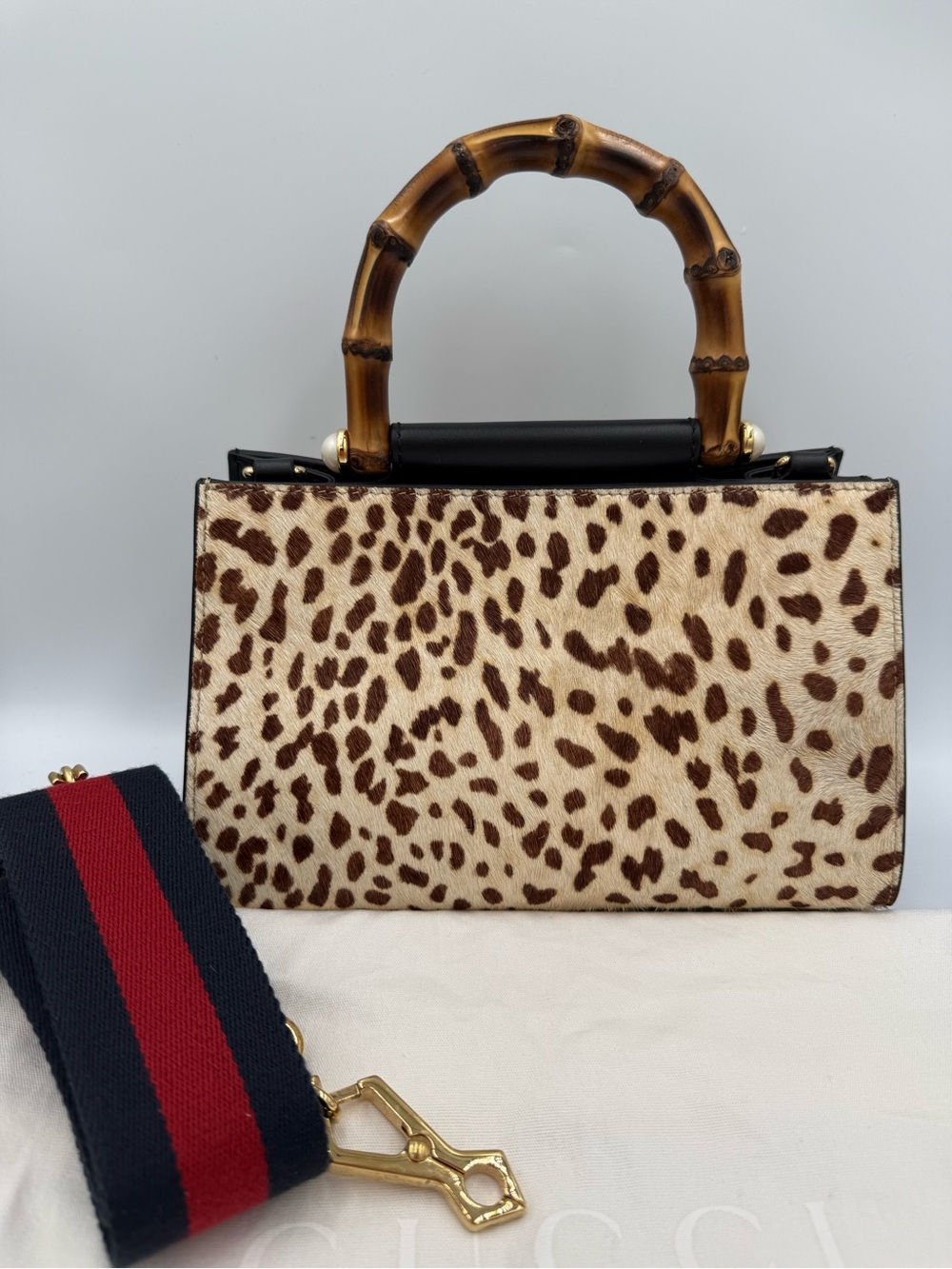 Gucci Bamboo Leopard-Print with detachable strap.